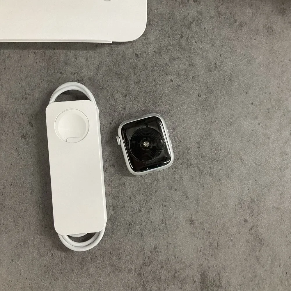 Apple Watch SE 44mm Silver Aluminum Case White Cellular Sport Band MYDQ2LL/A